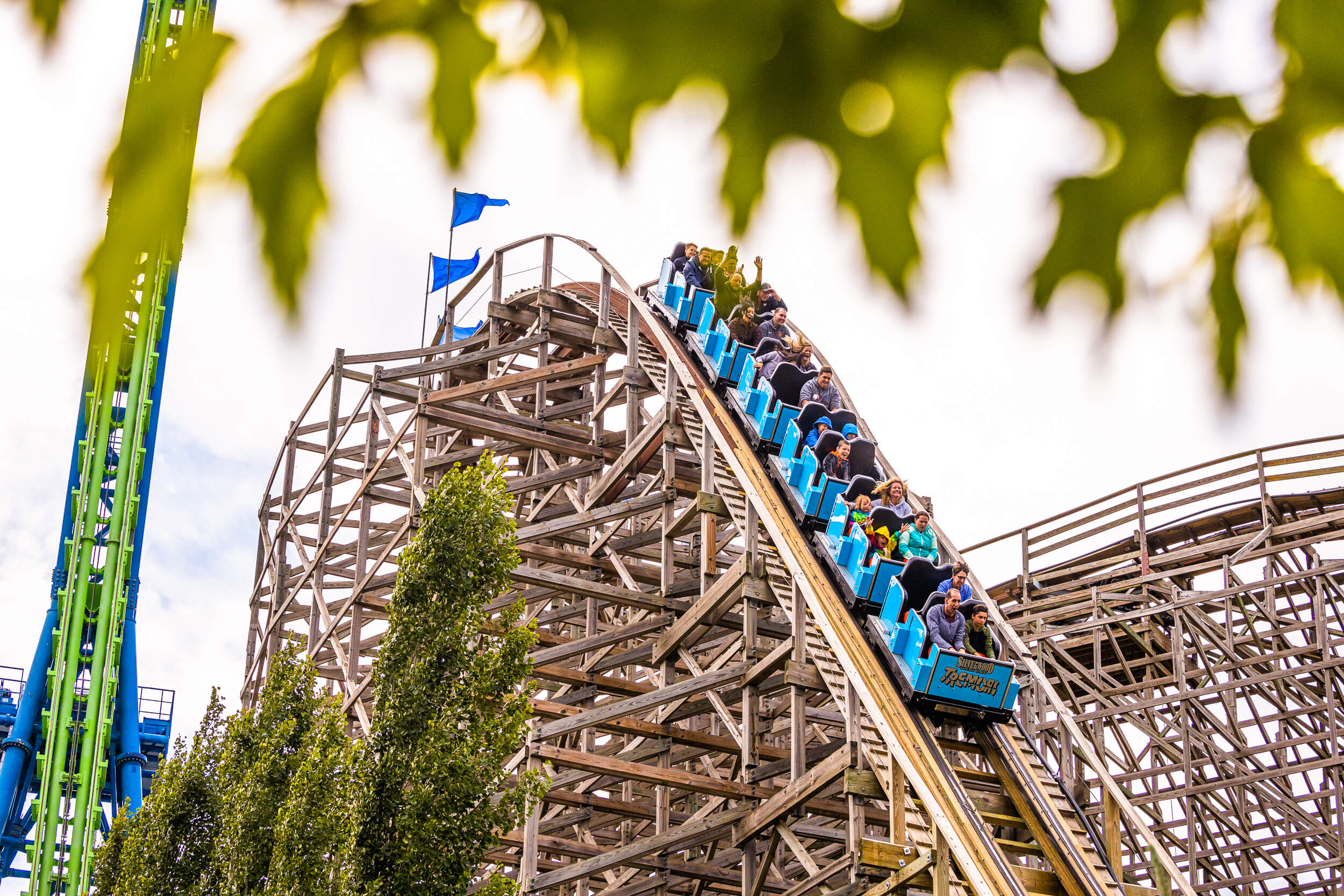 Idaho amusement park visitors ride the Tremors roller coaster at Silverwood Theme Park.