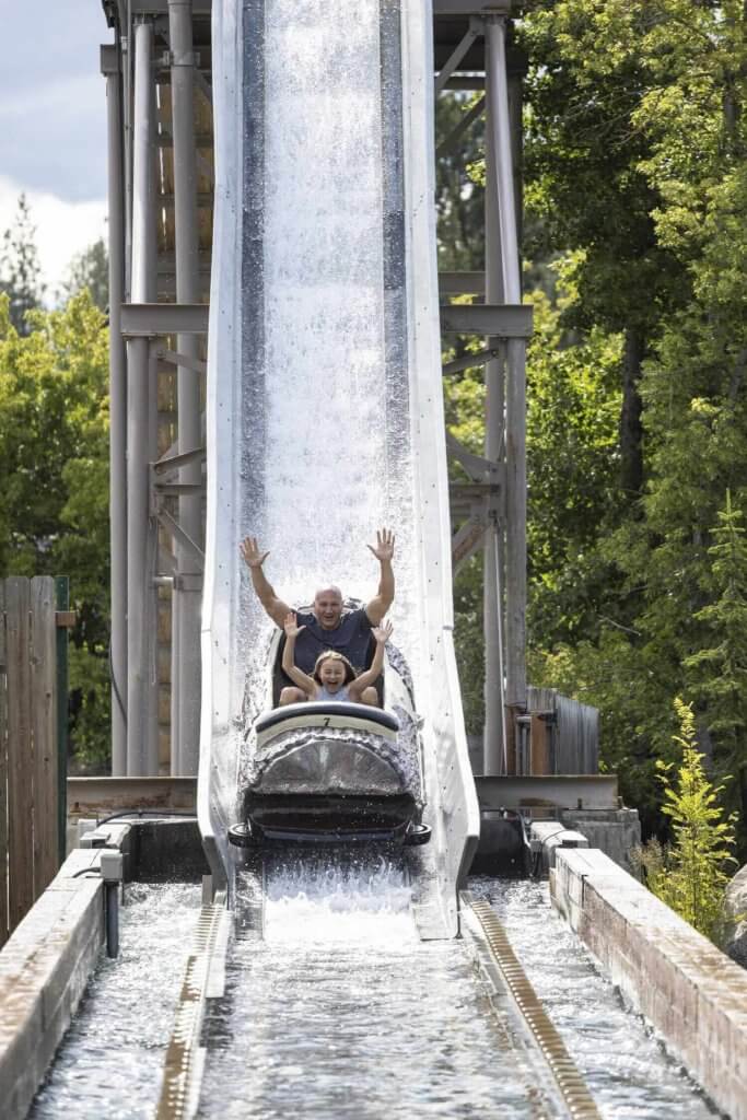 Dad and daughter on splash ride at Silverwood Theme Park.