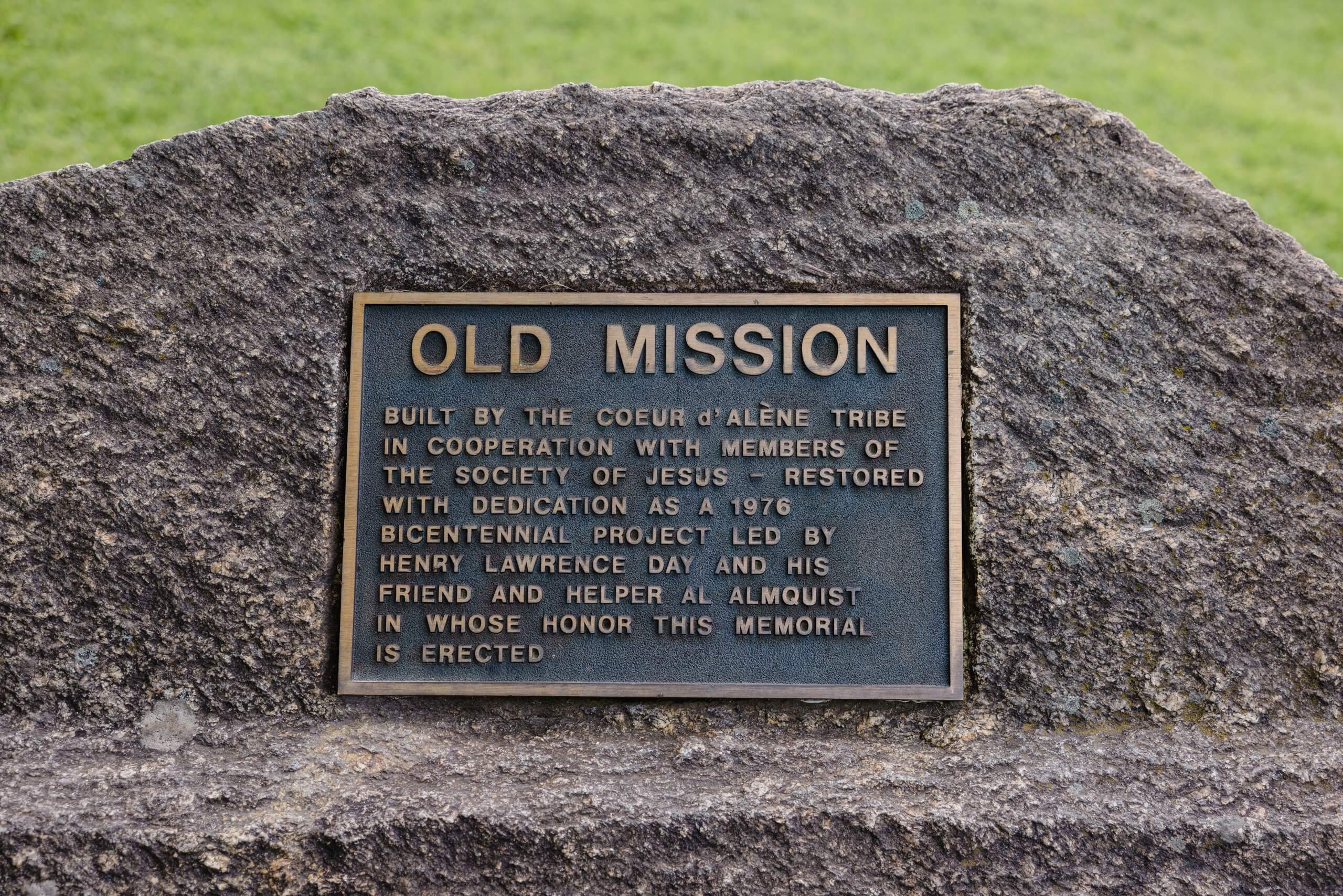 Old Mission plaque set in stone at Cataldo Mission.