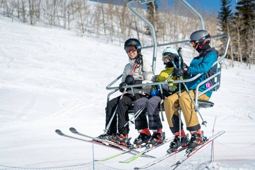 family on ski lift at Pomerelle