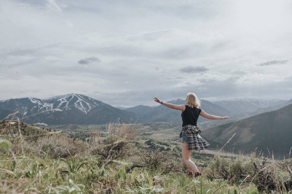 woman in wildflowers proctor mountain